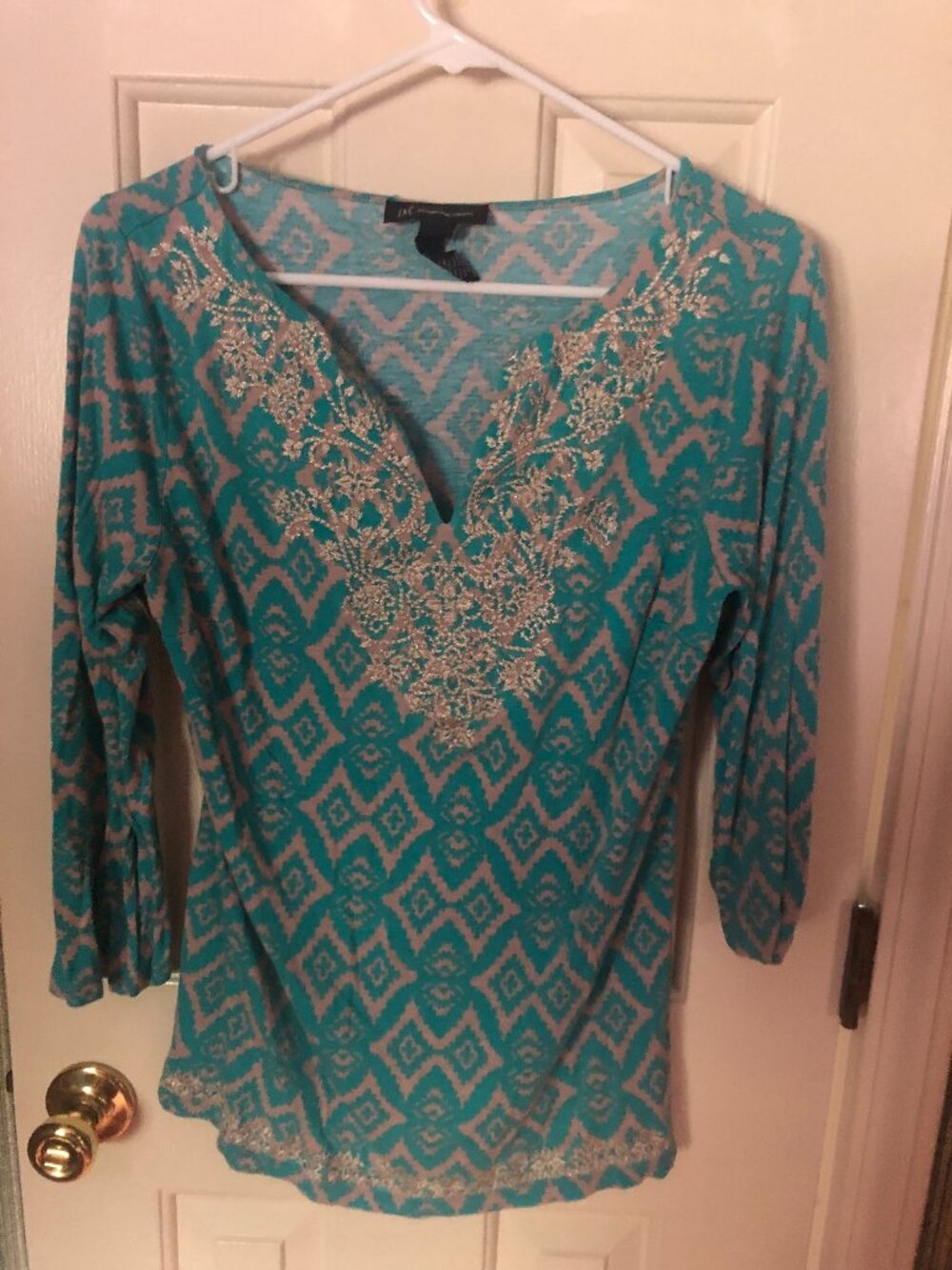 Light blue and pearl,light gold embroidery on front Sz Lg